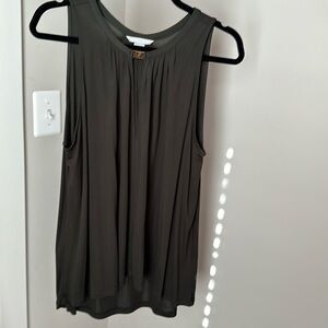 Olive green blouse with with gold tone clasp detail and v neck opening